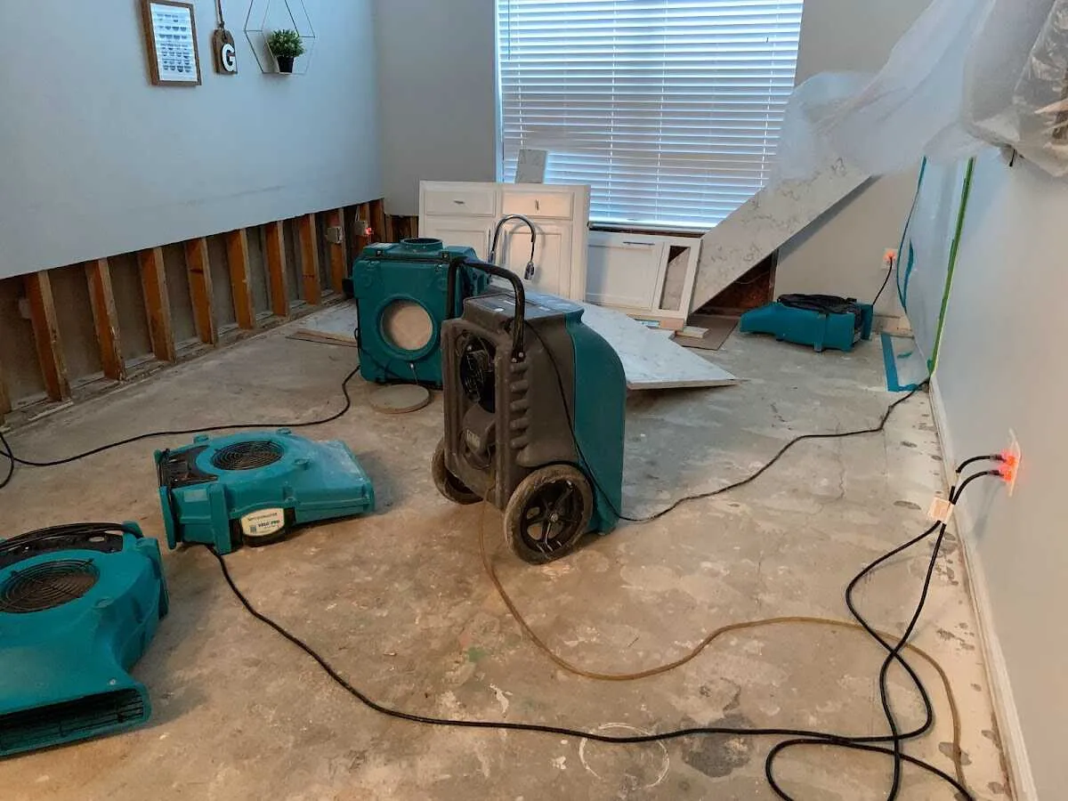 Dehumidifier in flood-cut room for Water Damage Restoration in Upper Deerfield